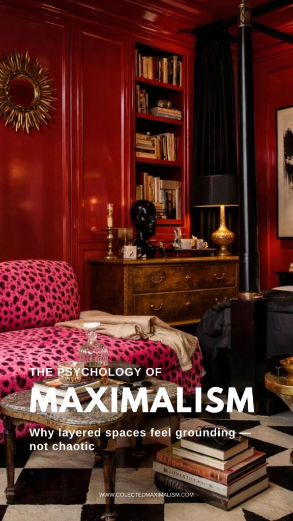 A dramatic red-paneled room with a pink leopard-print sofa, black four-poster bed frame, vintage wooden dresser, brass lamp, bookshelves, sunburst mirror, and black-and-white checkered floor under warm lighting.